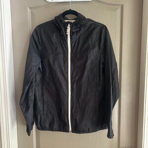 black windbreaker with white zip